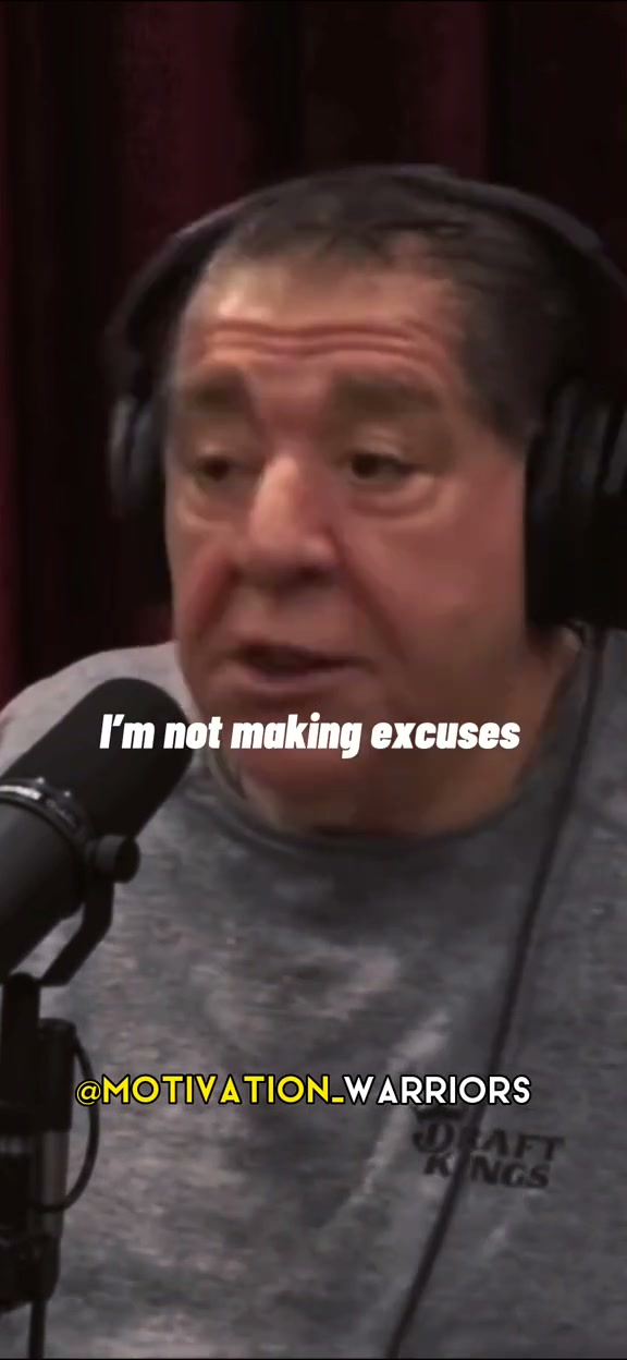 Podcast guest wearing headphones and speaking about accountability into a boom microphone